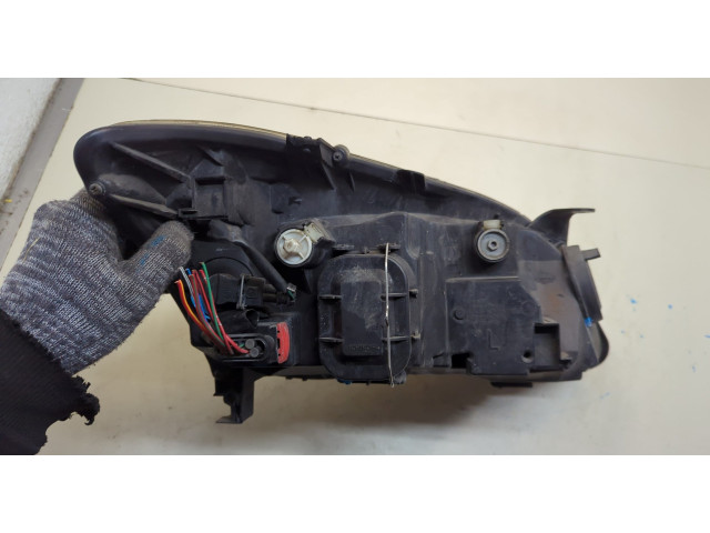 Фара передняя  Toyota Corolla E12 2001-2006 левая 