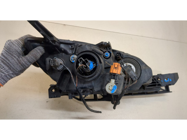 Фара передняя Mazda 3 (BK) 2003-2009 левая