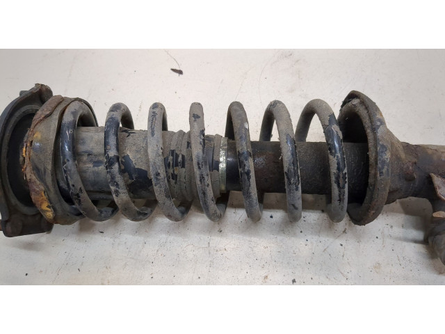 Стойка амортизатора  KIA Rio 2000-2005      