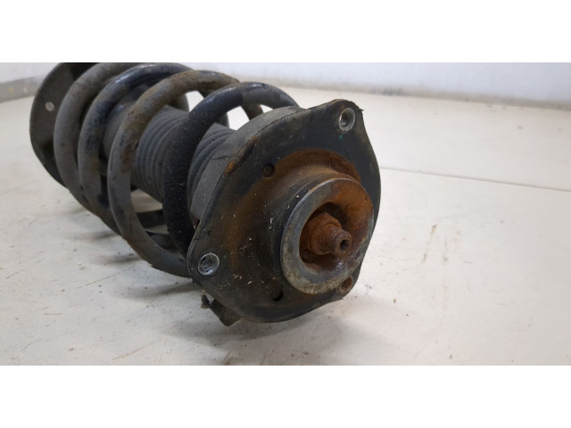 Стойка амортизатора Volkswagen Caddy 2010-2015