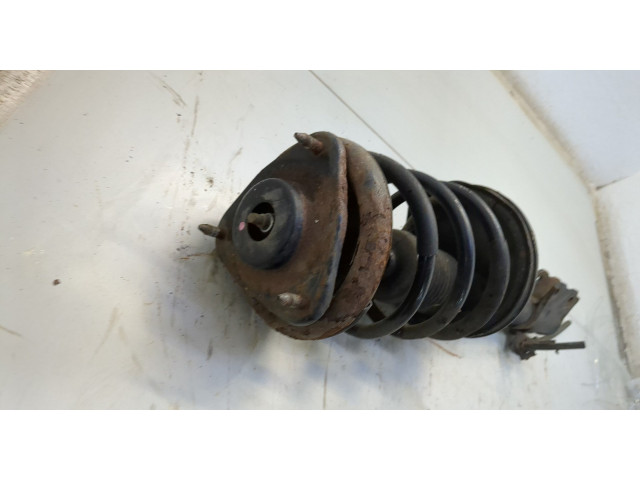 Стойка амортизатора  Mitsubishi Outlander 2003-2009 MN133394, MN101529     