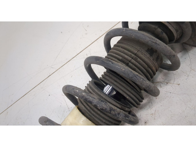 Стойка амортизатора Mitsubishi Colt 2002-2012