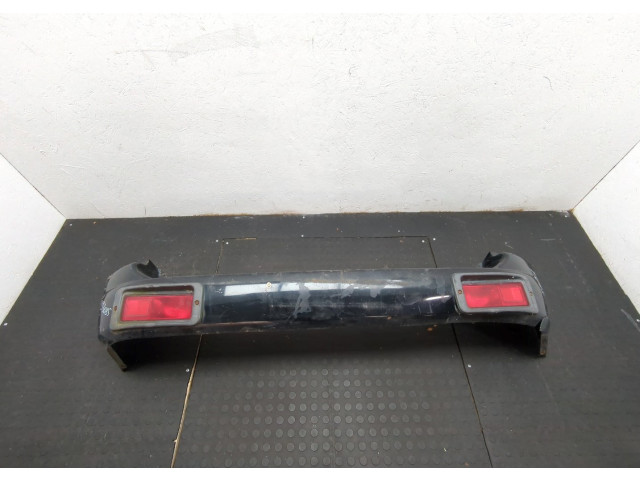Бампер Mitsubishi Montero Sport / Pajero Sport 1996-2008 задний