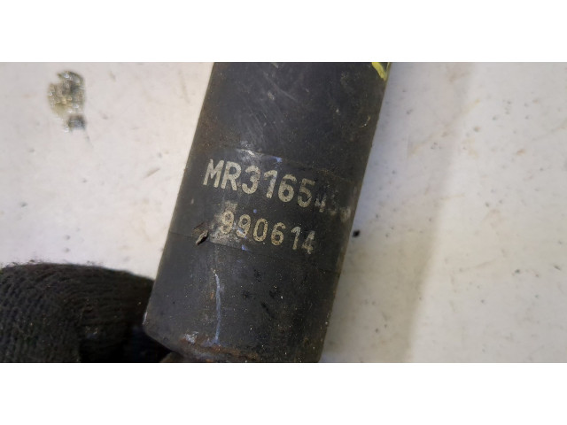 Стойка амортизатора  Mitsubishi Montero Sport / Pajero Sport 1996-2008 MR316549     