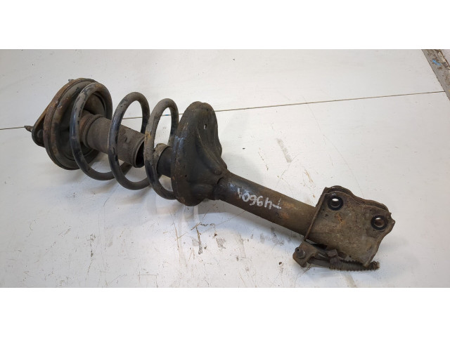 Стойка амортизатора Mitsubishi Outlander 2003-2009