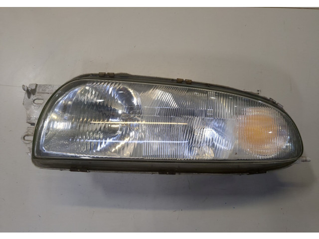 Фара передняя  Ford Fiesta 1995-2000 левая 