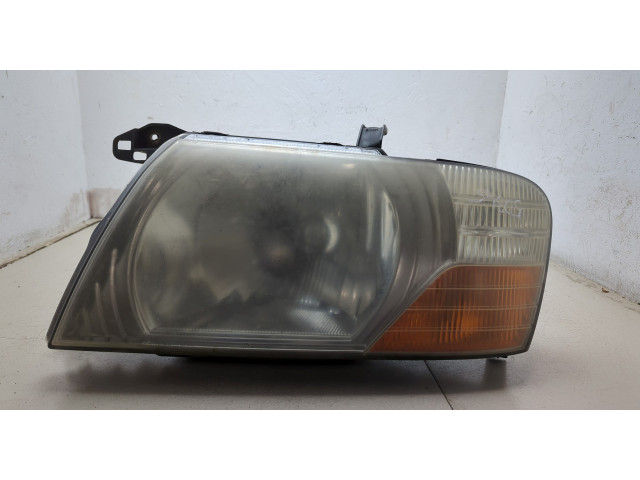Фара передняя  Mitsubishi Pajero / Montero 2000-2006 левая 