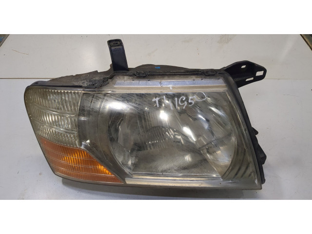 Фара передняя Mitsubishi Pajero / Montero 2000-2006 правая