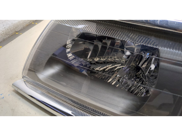 Фара передняя Mitsubishi Montero Sport / Pajero Sport 1996-2008 левая