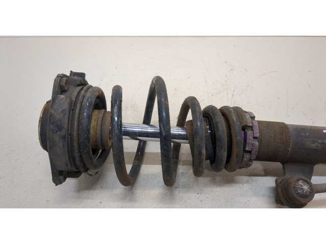 Стойка амортизатора Volkswagen Caddy 2004-2010