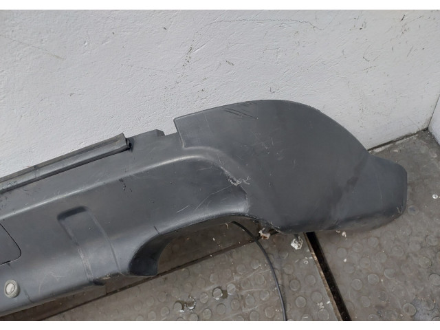 Бампер Mitsubishi Outlander XL 2006-2012 задний 6410A827