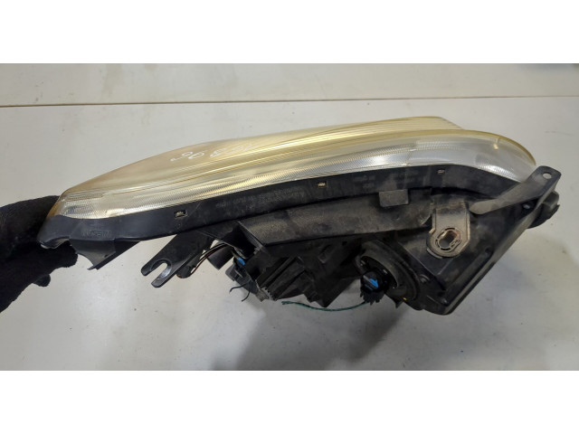 Фара передняя  Nissan Rogue 2007-2013 левая 
