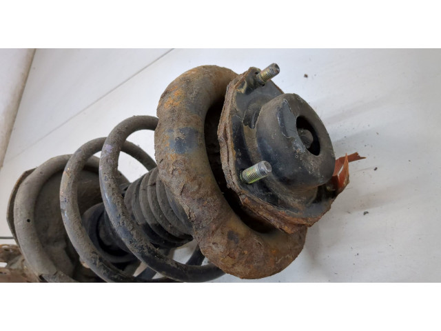 Стойка амортизатора  Nissan X-Trail (T30) 2001-2007 54302EQ025, 54010EQ02B     