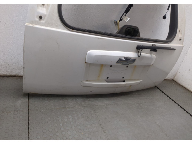 Замок багажника  Chevrolet Tahoe 2006-2014       