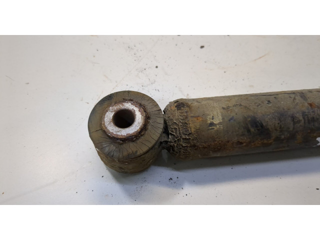 Стойка амортизатора  Nissan Tiida 2004-2010      