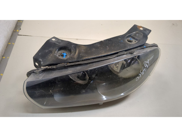 Фара передняя Volkswagen Scirocco 2008- левая