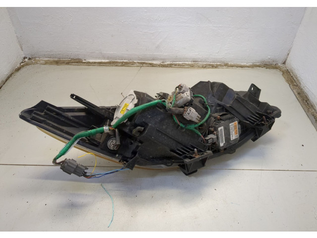 Фара передняя Mazda 3 (BL) 2009-2013 левая