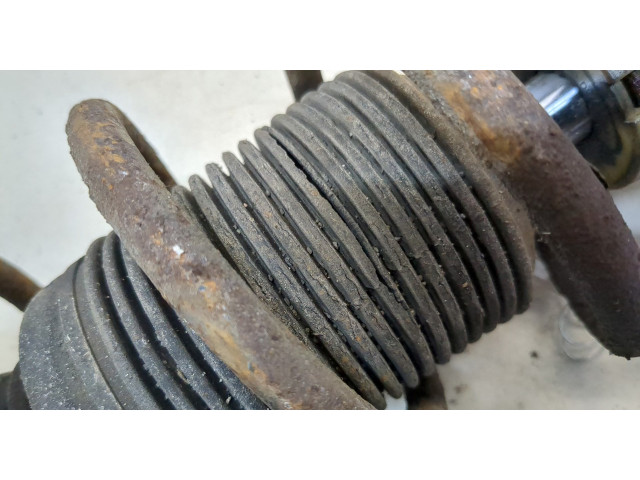 Стойка амортизатора Mitsubishi Colt 2004-2008