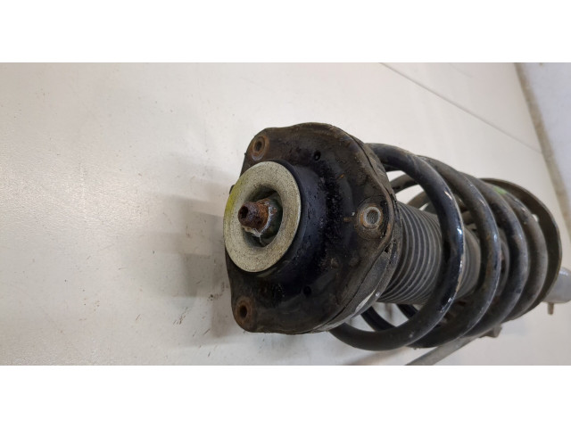 Стойка амортизатора Volkswagen Caddy 2010-2015 1T0413031HQ