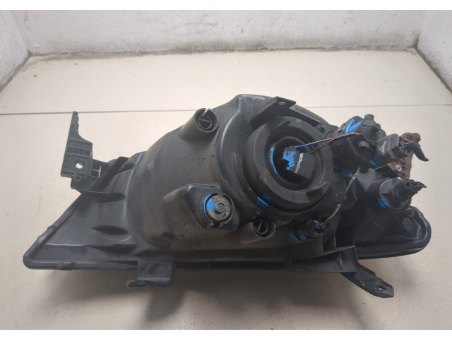 Фара передняя  Mitsubishi L200 2006-2015 левая 