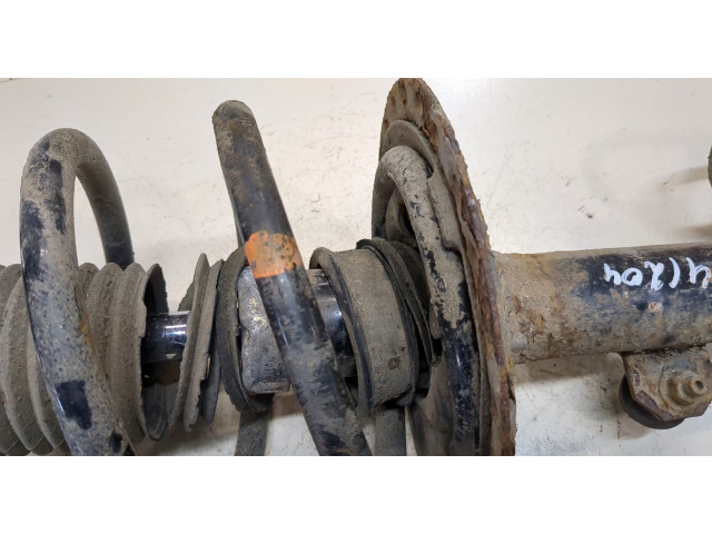 Стойка амортизатора Mitsubishi Outlander 2012-2015 гибрид