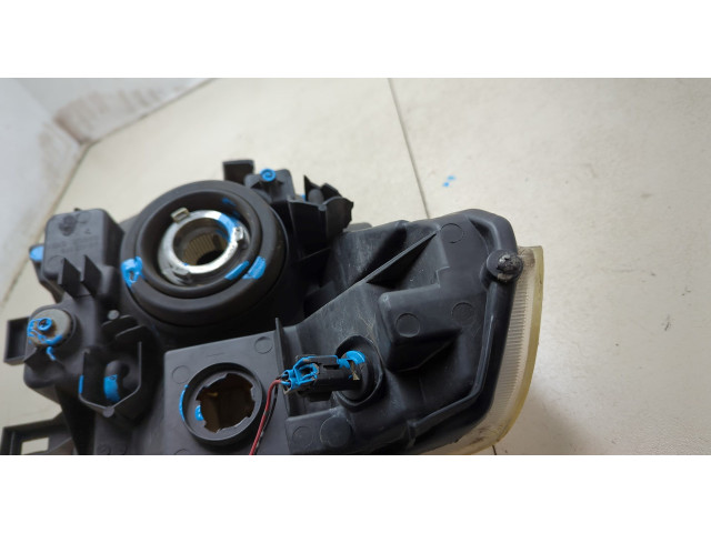 Фара передняя Nissan Pathfinder 2004-2014 левая