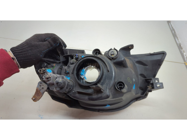 Фара передняя Mitsubishi L200 2006-2015 левая