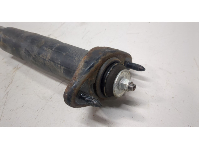 Стойка амортизатора  Mazda CX-7 2007-2012      