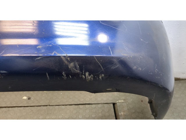 Бампер  KIA Carnival 1998-2006 задний   