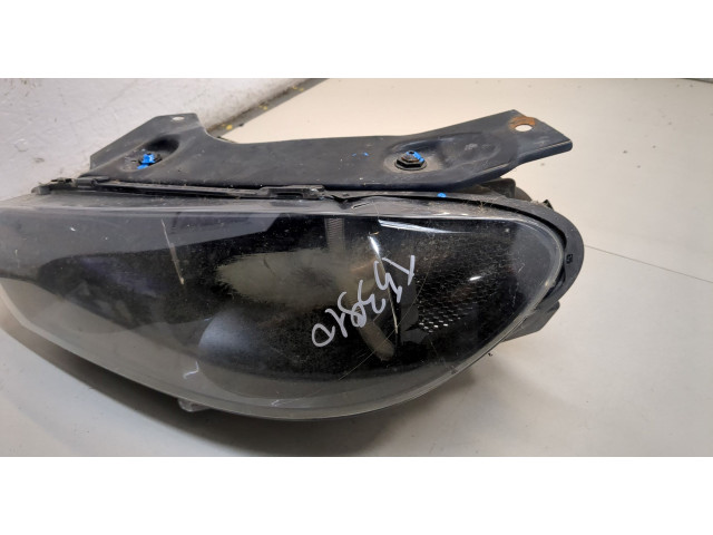 Фара передняя Volkswagen Scirocco 2008- левая