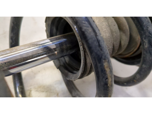 Стойка амортизатора Mitsubishi Colt 2002-2012 MR594024