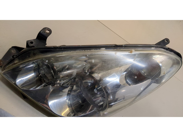 Фара передняя  Toyota Corolla Verso 2004-2009 левая 