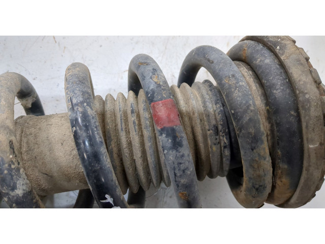 Стойка амортизатора  SsangYong Rexton 2012-2017      