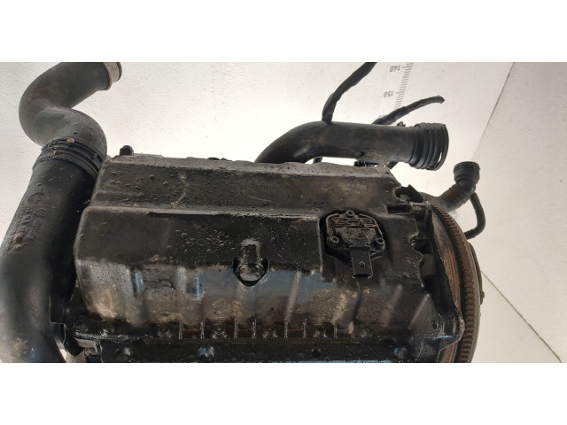 Форсунка топливная Volkswagen Golf Plus 038130073AG