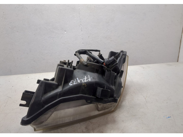 Фара передняя Nissan Pathfinder 2004-2014 правая