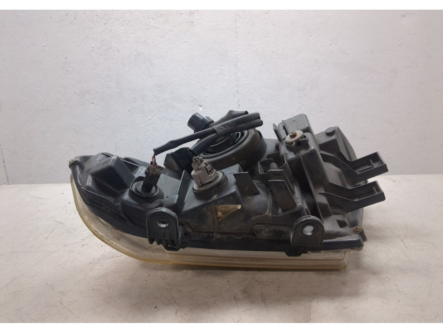 Фара передняя Nissan Pathfinder 2004-2014 правая