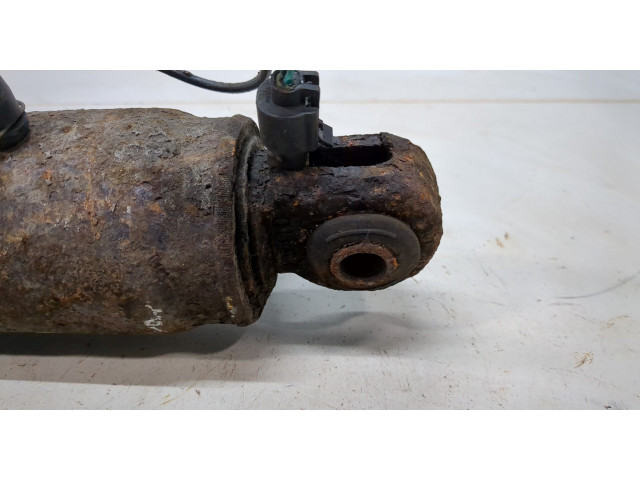 Стойка амортизатора  Chevrolet Tahoe 1999-2006      