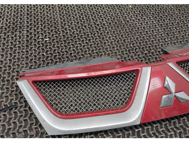 Решетка радиатора Mitsubishi Outlander XL 2006-2012 2.2 7450A037RB