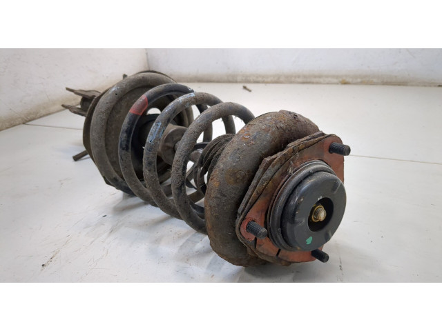 Стойка амортизатора  Nissan X-Trail (T30) 2001-2006      