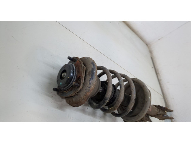 Стойка амортизатора  Nissan X-Trail (T30) 2001-2006 55303EQ025, 550208H762     