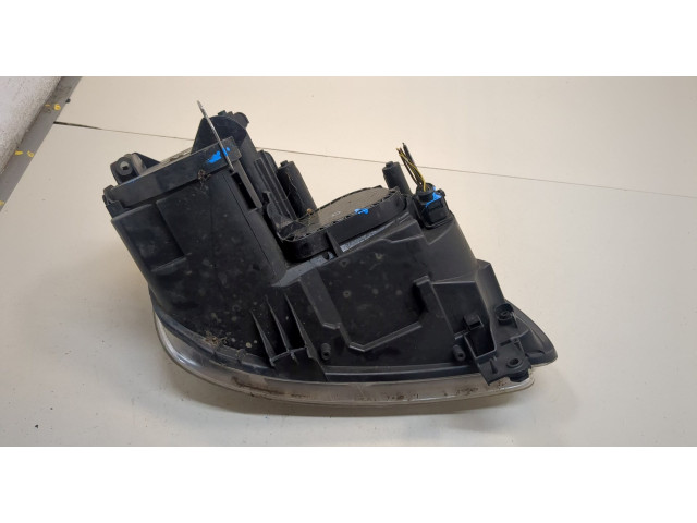 Фара передняя Volkswagen Caddy 2004-2015 левая