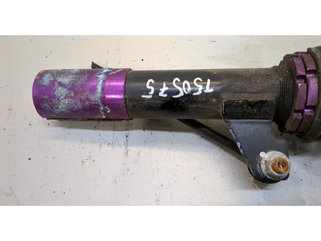 Стойка амортизатора  Volkswagen Caddy 2010-2015      