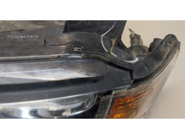Фара передняя Mitsubishi L200 2006-2015 левая