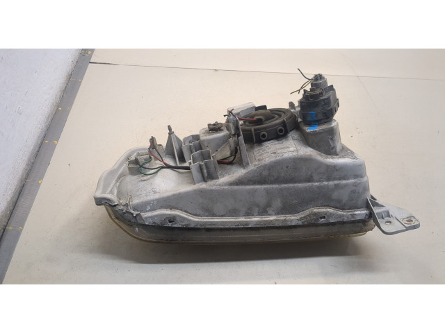 Фара передняя  Suzuki Grand Vitara 1997-2006 левая 