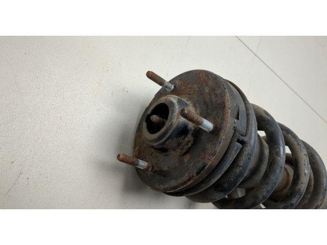 Стойка амортизатора  Chevrolet Tahoe 2006-2014      