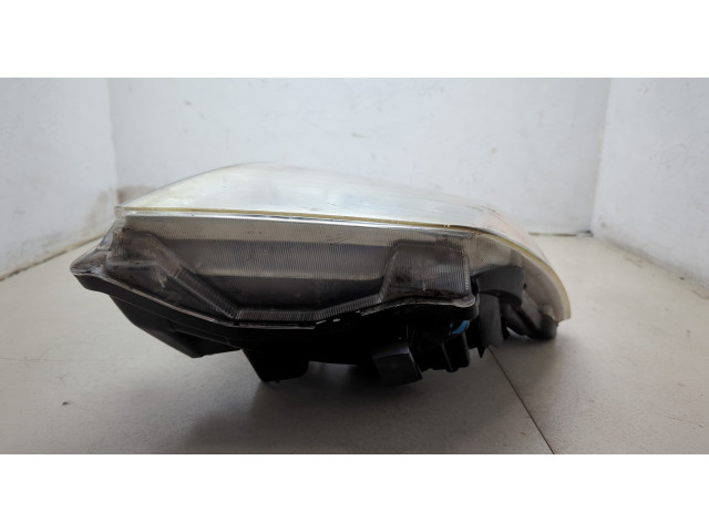 Фара передняя Nissan Pathfinder 2004-2014 левая