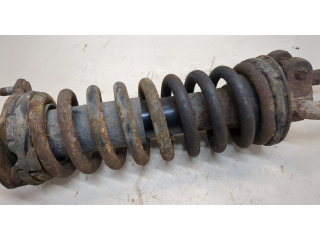 Стойка амортизатора Jeep Liberty 2002-2006