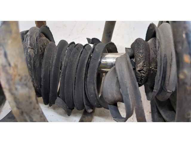 Стойка амортизатора  Nissan X-Trail (T30) 2001-2007 54303EQ025, 54010EQ02B     