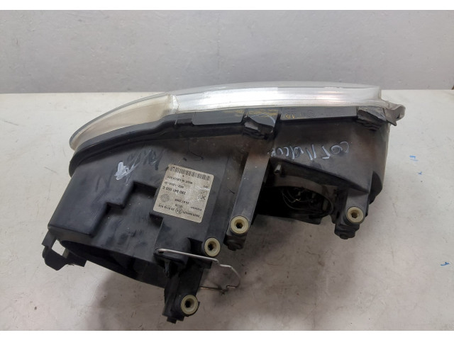 Фара передняя  Volkswagen Caddy 2004-2015 левая 