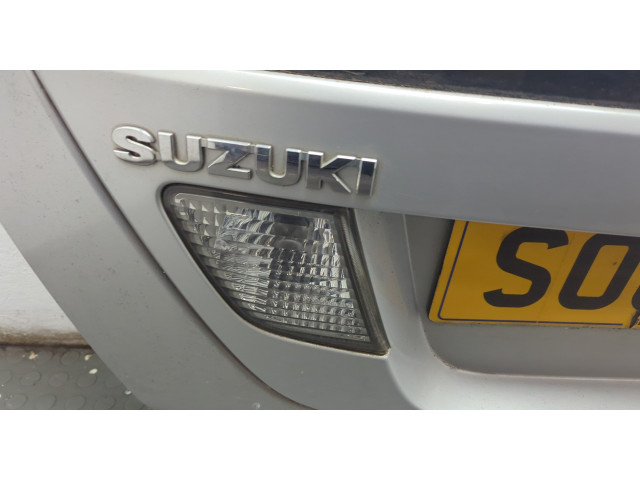 Замок багажника  Suzuki Liana 2001-2008       